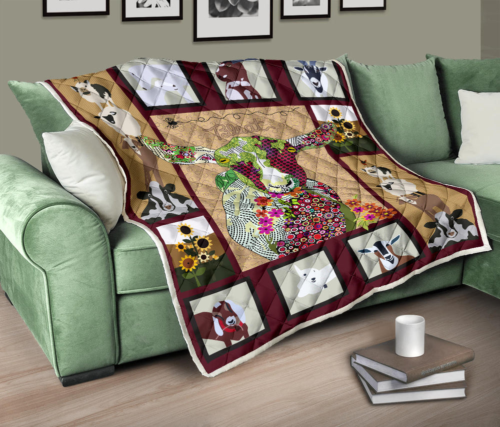 Baby goat on farm quilt