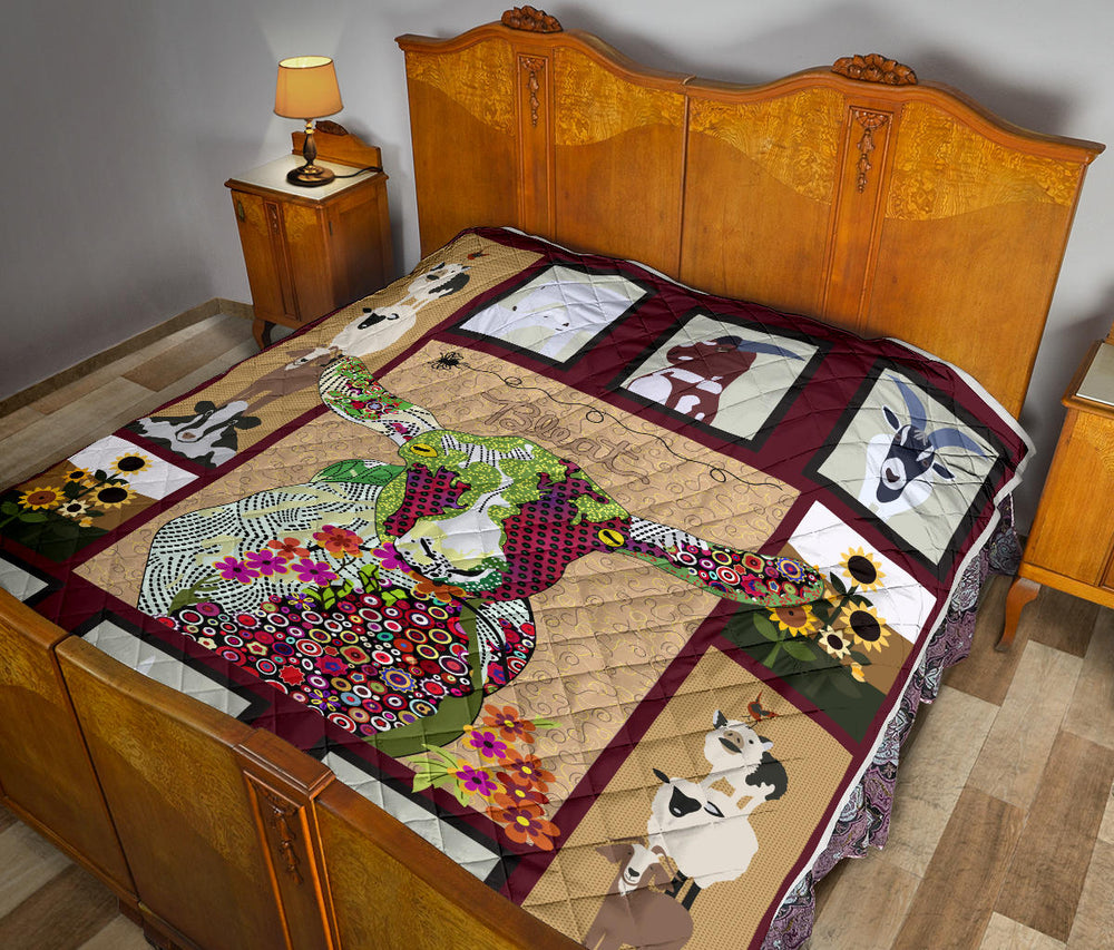 Baby goat on farm quilt