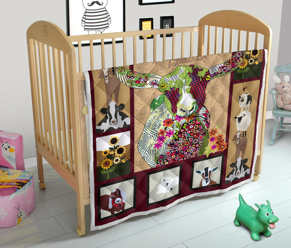 Baby goat on farm quilt