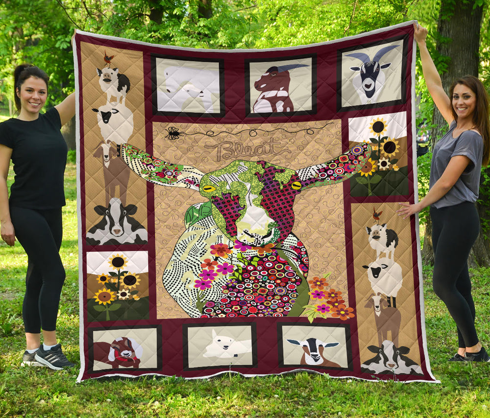 Baby goat on farm quilt