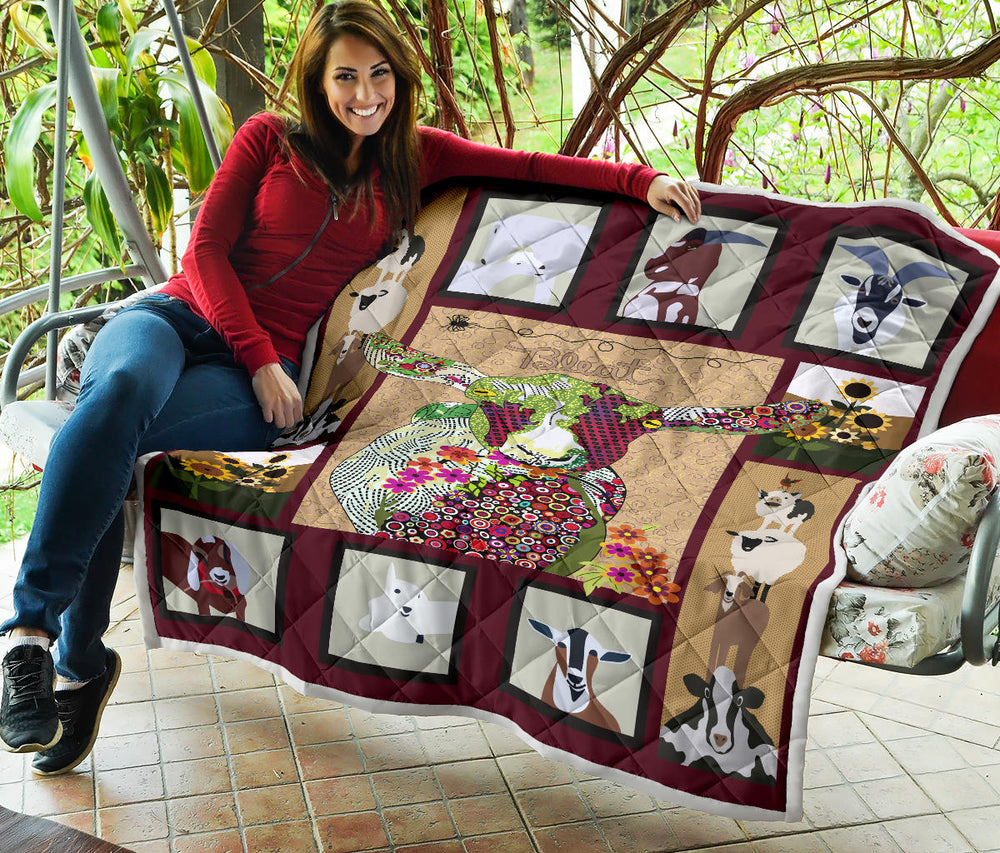 Baby goat on farm quilt