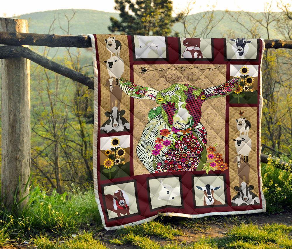 Baby goat on farm quilt