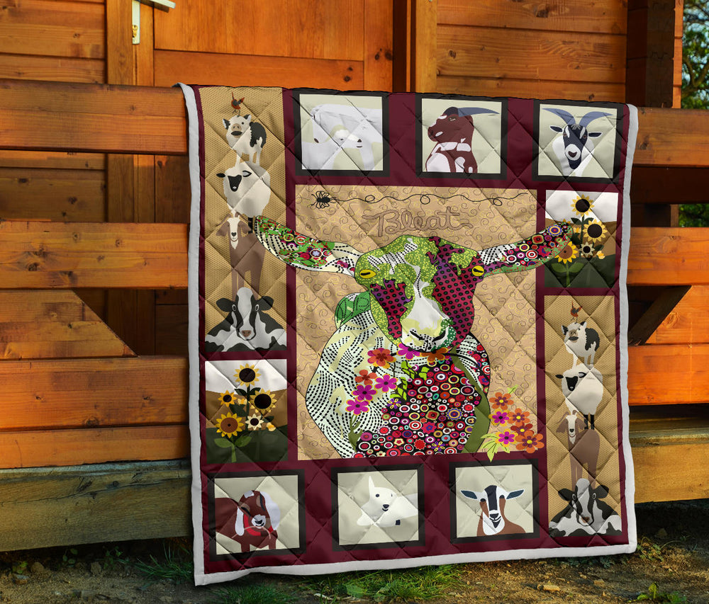 Baby goat on farm quilt