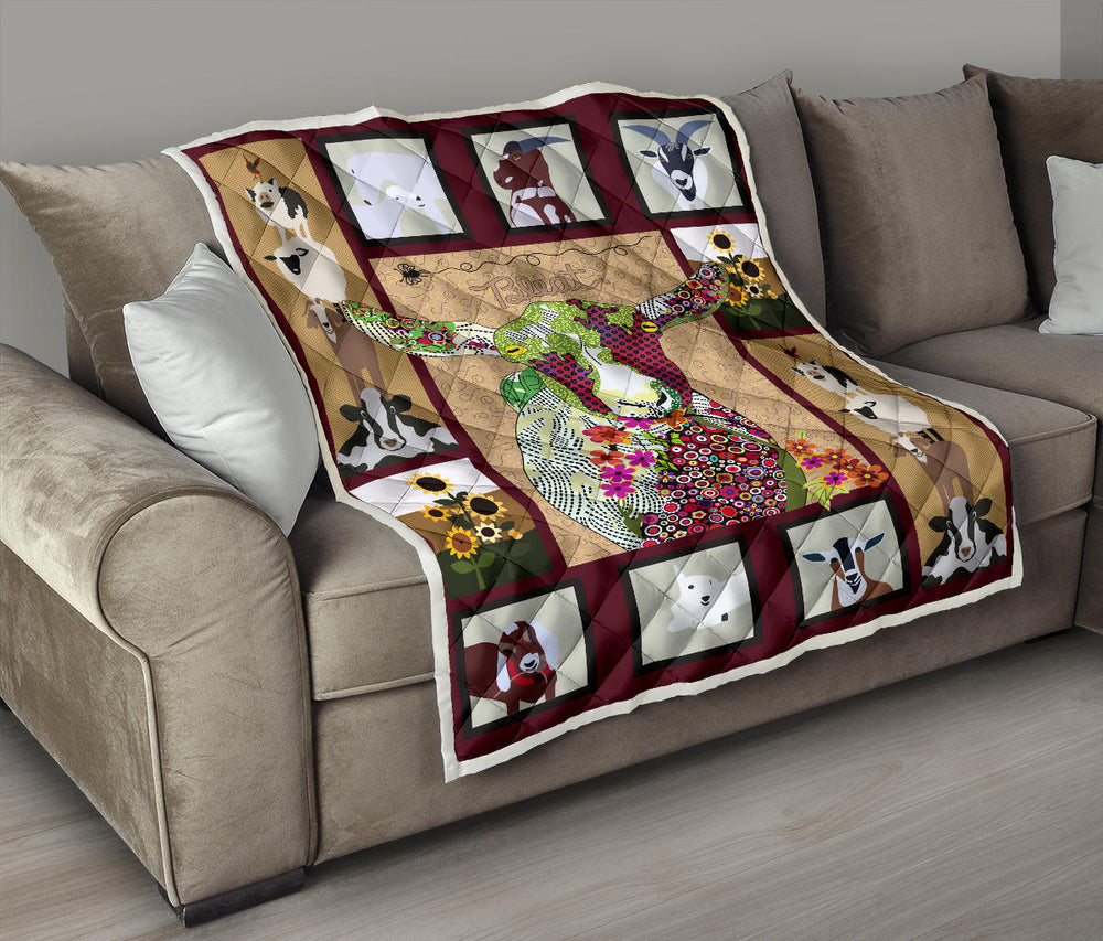 Baby goat on farm quilt